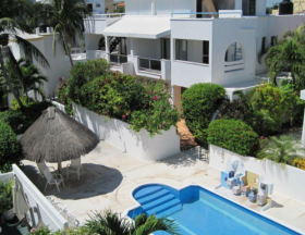 House with roof top water tank in Puerto Morelos, Mexico  – Best Places In The World To Retire – International Living